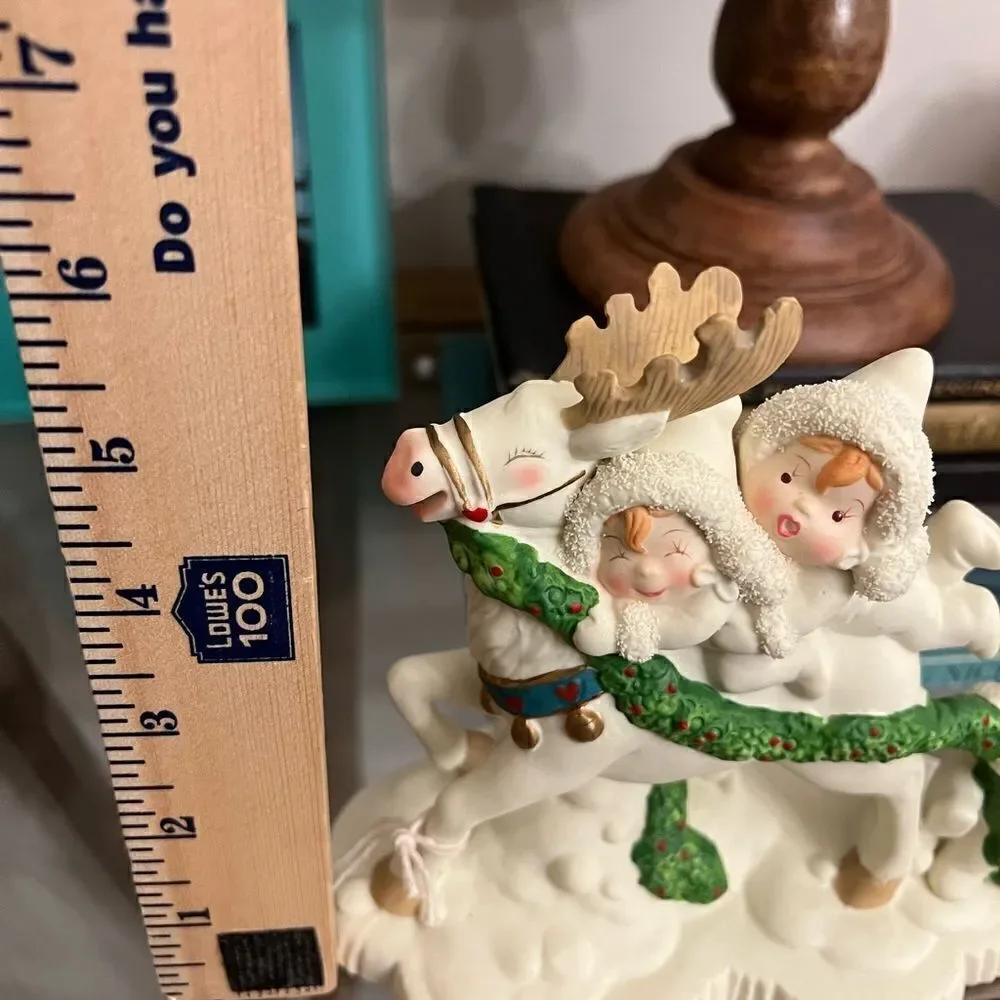 Christmas Vintage Tykes on Ice Magical Ride Porcelain Figurine.